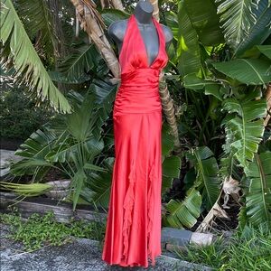 Bari J satin halter gown with ruffled slits and back bow